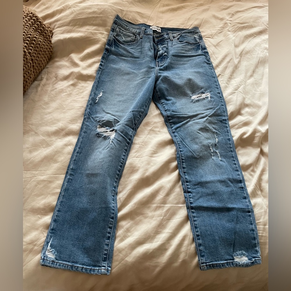 Women's Distressed Blue Jeans